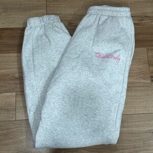 Edikted Light Gray Joggers with Pink Script Bow Logo